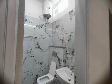 Bathroom in 2 BHK Apartment at Dhakoli – for Rent