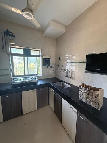 Kitchen in 2 BHK Apartment at Mount Sea View Apartment, Versova – for Rent