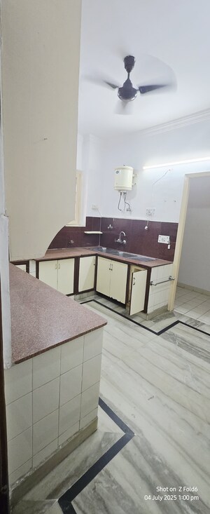 Kitchen in 4 BHK Builder Floor at Sarvodaya Enclave – for Rent
