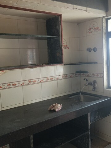 Kitchen in 1.5 BHK Apartment at New Evershine Gardens, Vasai West – for Rent