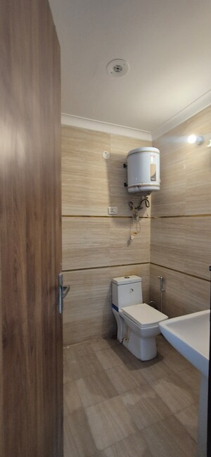 Bathroom in 2 BHK Builder Floor at Chattarpur – for Rent