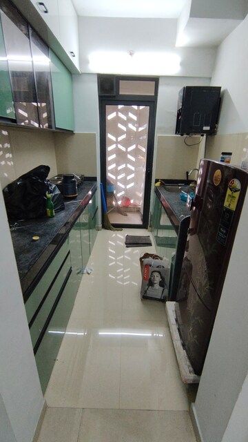 Kitchen in 2 BHK Apartment at Lodha Palava Downtown, Dombivli East – for Rent