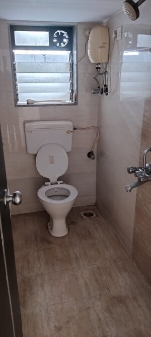 Bathroom in 3 BHK Apartment at Bangur Nagar – for Sale