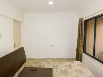 Bedroom in 3 BHK Apartment at Dheeraj Gaurav Heights, Jogeshwari West – for Rent