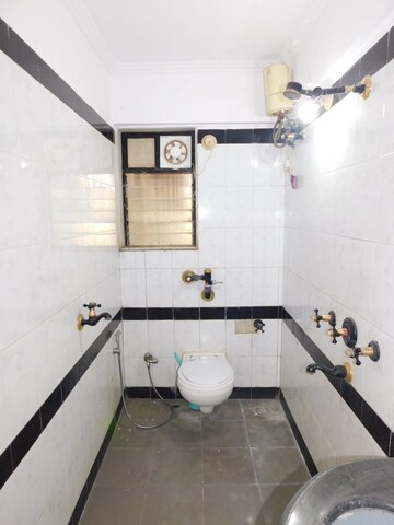 Bathroom in 3 BHK Apartment at Dheeraj Gaurav Heights, Jogeshwari West – for Rent