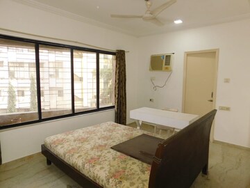 Bedroom in 3 BHK Apartment at Dheeraj Gaurav Heights, Jogeshwari West – for Rent
