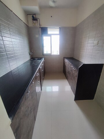 Kitchen in 2 BHK Apartment at Vihang Valley Phase 3, Kasarvadavali – for Rent