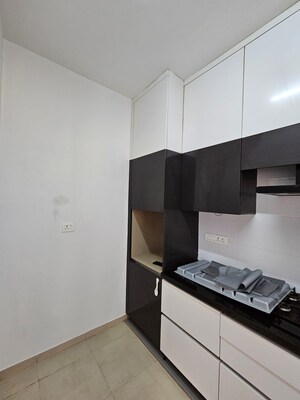 Kitchen in 2 BHK Apartment at Bhartiya Nikoo Homes, Thanisandra Main Road – for Rent