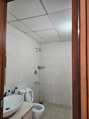 Bathroom in 2 BHK Apartment at Bhartiya Nikoo Homes, Thanisandra Main Road – for Rent