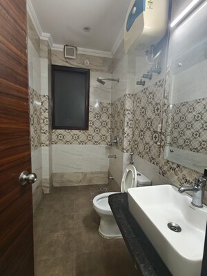 Bathroom in 2 BHK Builder Floor at Ansal Sushant Lok I, Sector 43 – for Rent