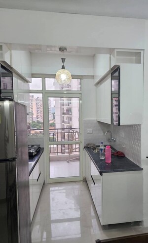 Kitchen in 2 BHK Apartment at Suncity Avenue 76, Sector 76 – for Rent