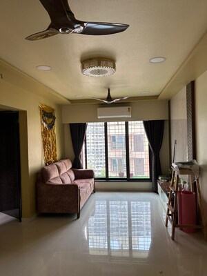 Living Room in 2 BHK Apartment at Bredco Viceroy Court, Kandivali East – for Sale
