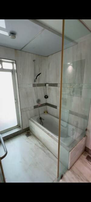 Bathroom in 4 BHK Apartment at Transcon Flora Heights, Andheri West – for Rent