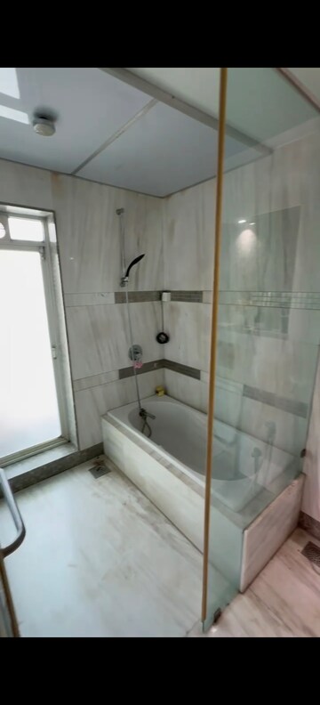 Bathroom in 4 BHK Apartment at Transcon Flora Heights, Andheri West – for Rent