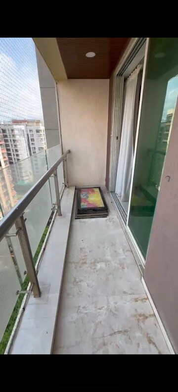 Balcony in 4 BHK Apartment at Transcon Flora Heights, Andheri West – for Rent
