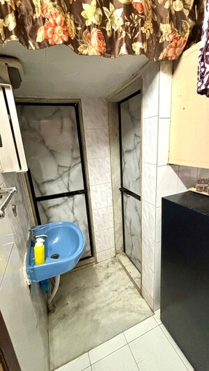 Bathroom in 1 BHK Apartment at Evershine Park, Andheri West – for Rent