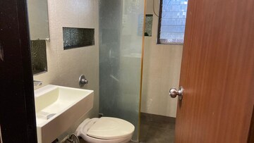 Bathroom in 3 BHK Apartment at Lashkaria Green Woods, Andheri West – for Rent