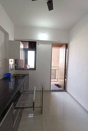 Kitchen in 2 BHK Apartment at Lodha Panacea 1, Dombivli East – for Rent