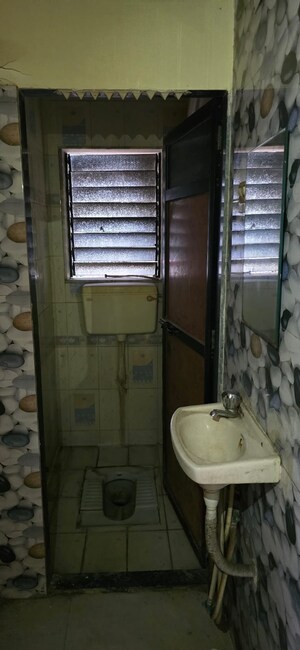 Bathroom in 2.5 BHK Apartment at Yashwant Arcade, Kopar Khairane – for Rent