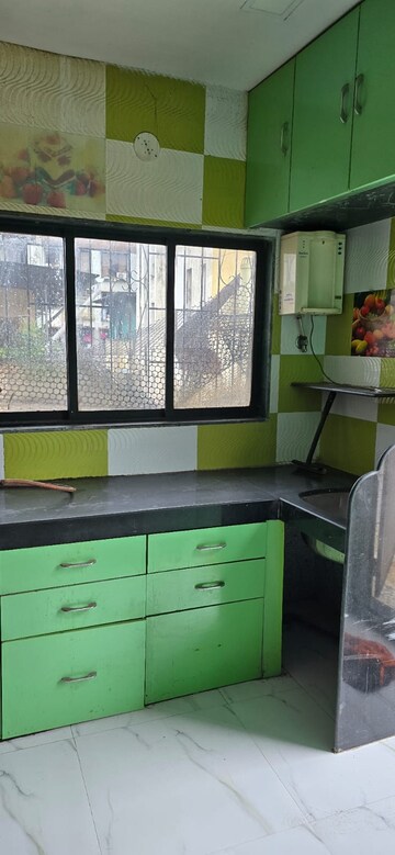 Kitchen in 2.5 BHK Apartment at Yashwant Arcade, Kopar Khairane – for Rent
