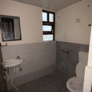 Bathroom in 2 BHK Apartment at Auric City Homes, Neharpar Phase 2 – for Rent