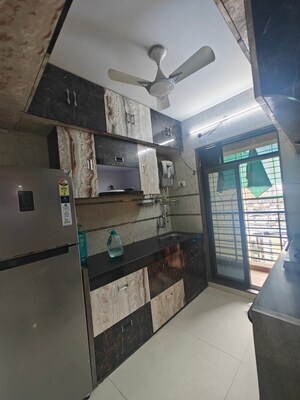 Kitchen in 2 BHK Apartment at Juhi Lawns, Seawoods – for Rent