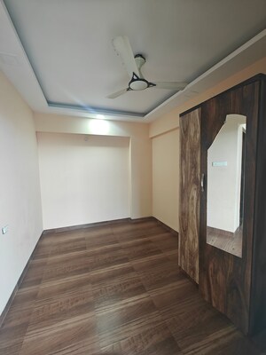 Room in 2 BHK Apartment at Juhi Lawns, Seawoods – for Rent