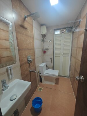 Bathroom in 2 BHK Apartment at Juhi Lawns, Seawoods – for Rent