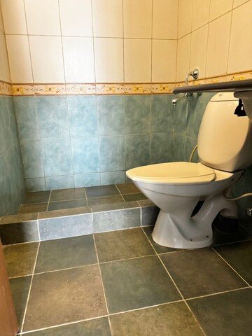 Bathroom in 2 BHK Apartment at Embassy Habitat, Palace Road – for Sale