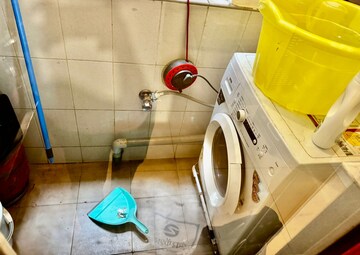 Bathroom in 2 BHK Apartment at Embassy Habitat, Palace Road – for Sale