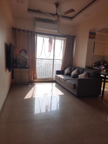 Living Room in 1 BHK Apartment at Daulat Nagar CHS, Kopri – for Sale