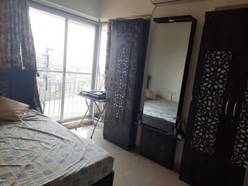Bedroom in 1 BHK Apartment at Daulat Nagar CHS, Kopri – for Sale