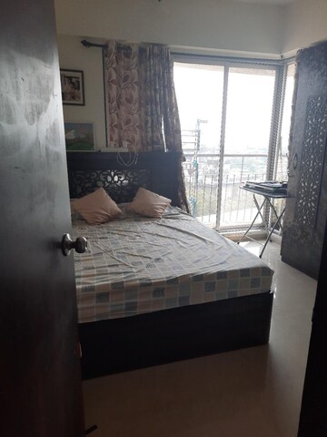 Bedroom in 1 BHK Apartment at Daulat Nagar CHS, Kopri – for Sale