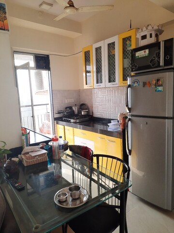 Kitchen in 1 BHK Apartment at Daulat Nagar CHS, Kopri – for Sale