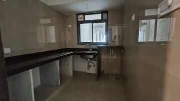 Kitchen in 2 BHK Apartment at Chandak Cornerstone, Worli – for Rent