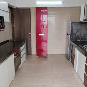 Kitchen in 2 BHK Apartment at Venus Towers Andheri West, Ambivali – for Rent