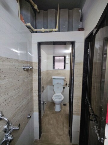 Building Lobby in 1 BHK Apartment at Vihang Golden Hills, Owale – for Rent