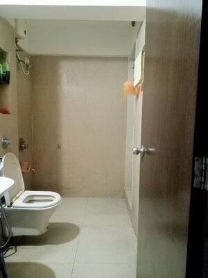 Bathroom in 1 BHK Apartment at Vihang Valley Phase 3, Kasarvadavali – for Rent