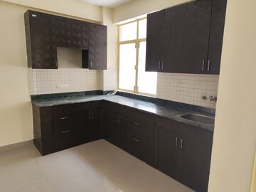 Kitchen in 2 BHK Apartment at Breez Global Heights, Sohna Sector 33 – for Sale