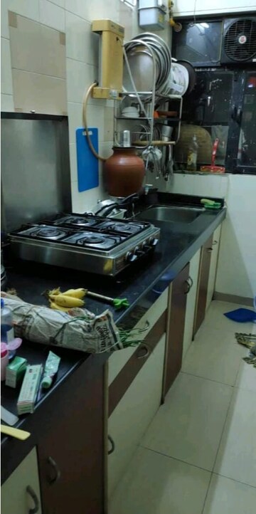 Kitchen in 1 BHK Apartment at Gala Pride Park, Manpada – for Rent