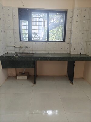 Kitchen in 1 BHK Apartment at Sun City Phase I, Sinhagad Road – for Rent