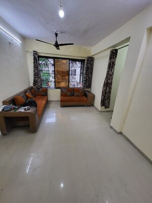 Living Room in 1 BHK Apartment at Kopar Khairane – for Rent