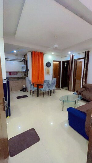 Living Room in 1 BHK Apartment at CRS Pratham, Rajpur – for Rent