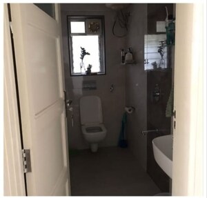 Bathroom in 3 BHK Apartment at Amaltas CHS, Andheri West – for Sale