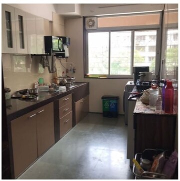 Kitchen in 3 BHK Apartment at Amaltas CHS, Andheri West – for Sale