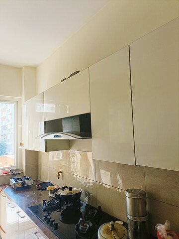 Kitchen in 3.5 BHK Apartment at Emaar Palm Heights, Sector 77 – for Sale