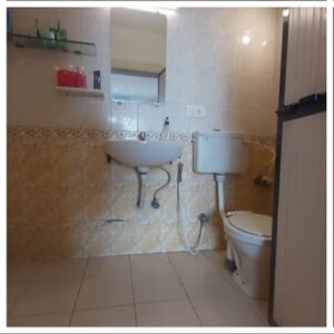 Bathroom in 4 BHK Apartment at Versova Shubham Karoti CHS, Andheri West – for Sale