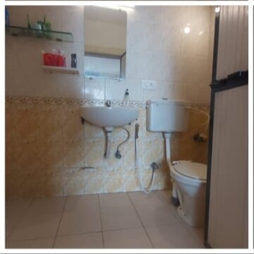 Bathroom in 4 BHK Apartment at Versova Shubham Karoti CHS, Andheri West – for Sale