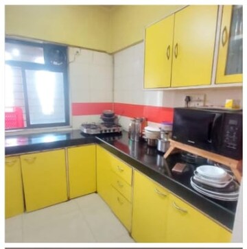 Kitchen in 4 BHK Apartment at Versova Shubham Karoti CHS, Andheri West – for Sale