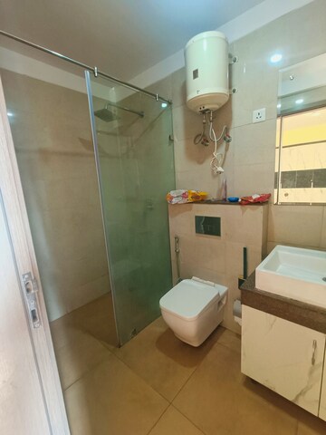 Bathroom in 3.5 BHK Apartment at Emaar Palm Heights, Sector 77 – for Sale